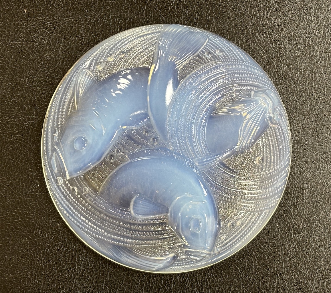 Pierre D'Avesn - a Lalique style opalescent glass dish, moulded in relief with three carp among waves, 30cm diameter